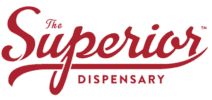 Logo for The Superior Dispensary in red cursive and block lettering on a light background.